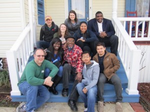 Belmont staff and students smile with Dr. John Perkins during their Immersion trip to Jackson, Miss.